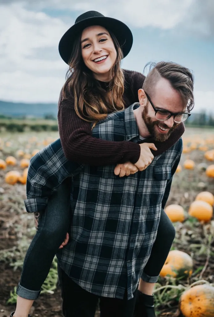 Consider A Pumpkin Patch Photoshoot for Fall Couple Photoshoot Ideas
