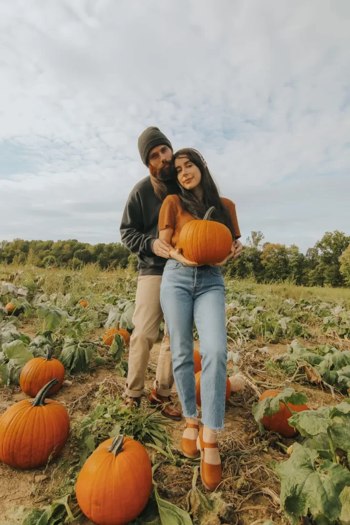 Consider A Pumpkin Patch Photoshoot for Fall Couple Photoshoot Ideas 2