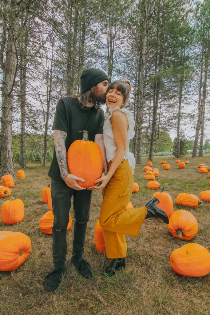 Consider A Pumpkin Patch Photoshoot for Fall Couple Photoshoot Ideas 3